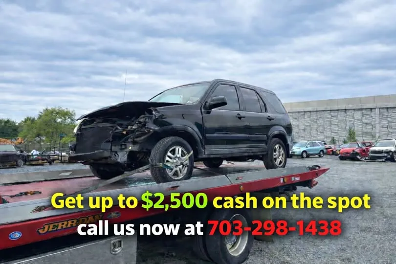 Wrecked Honda CR-V loaded on the flatbed — cash paid on the spot
