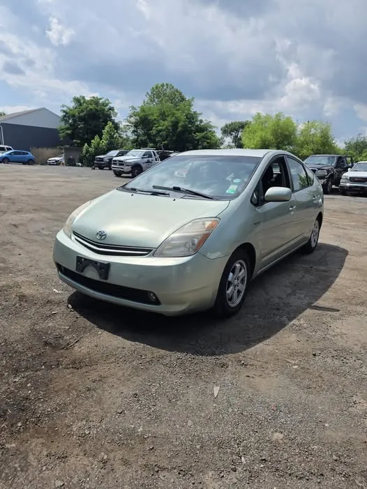 Toyota Prius bought and removed by DMV Tow Trucks